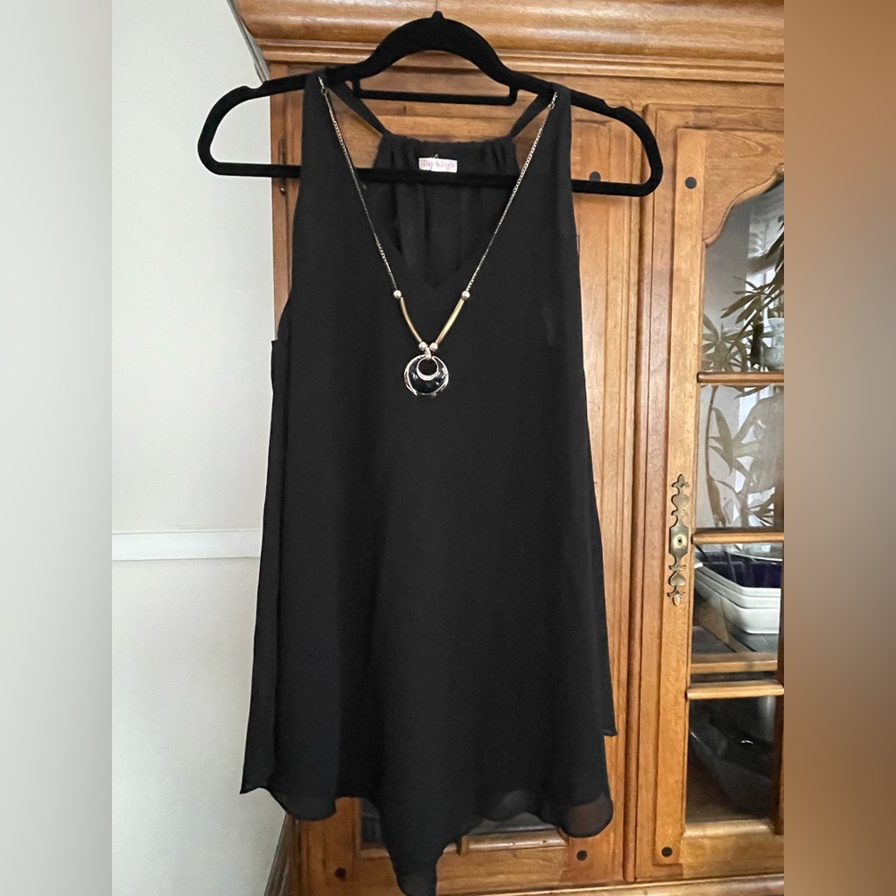 Sheer black top with attached necklace